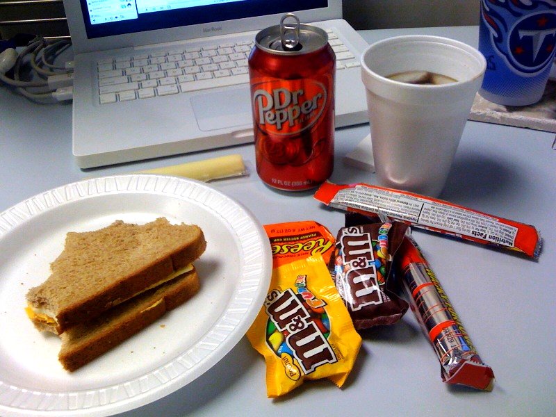 Candy and soda at desk for lunch