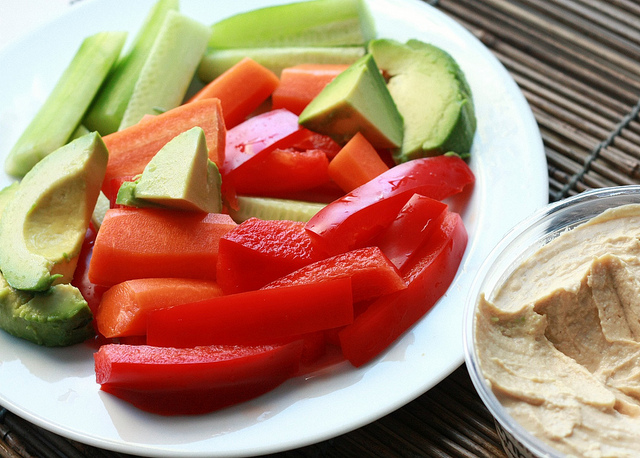 sliced vegetables and hummus