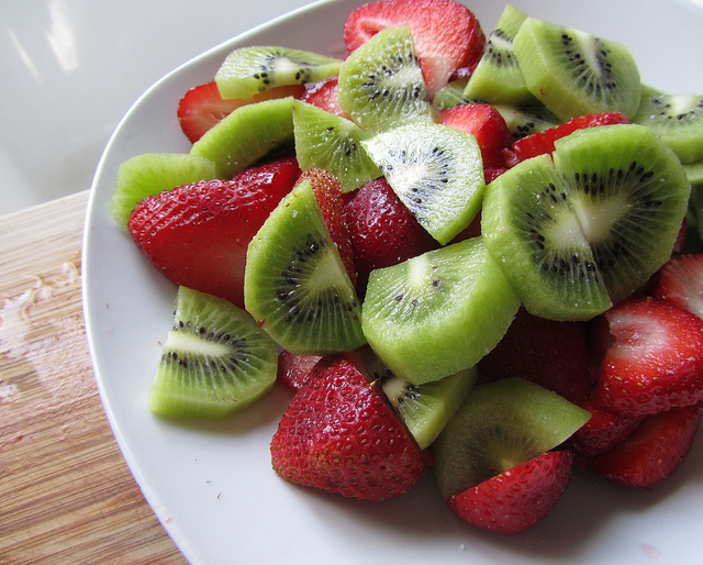 plate of strawberries and kiwis