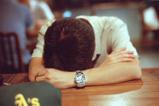 coworker sleeping on desk