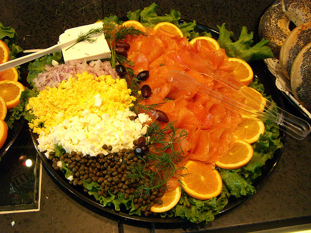 Platter of salmon and bagel toppings