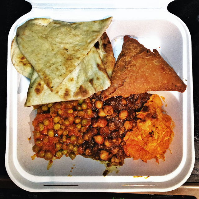 Indian takeout container with chickpeas
