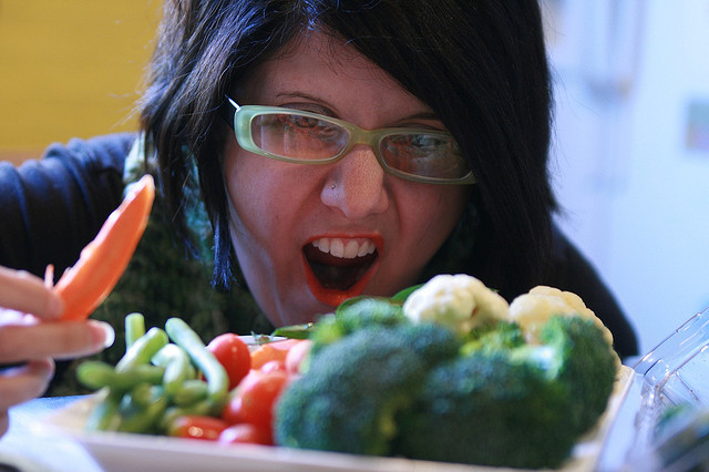 woman excited about vegetables