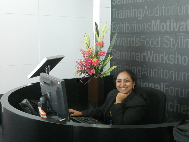 administrative assistant with flowers