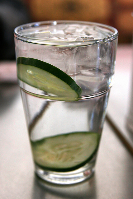 glass of water with cucumber slices