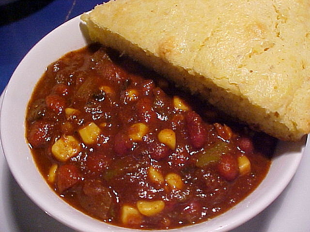 bowl of chili with cornbread food delivery