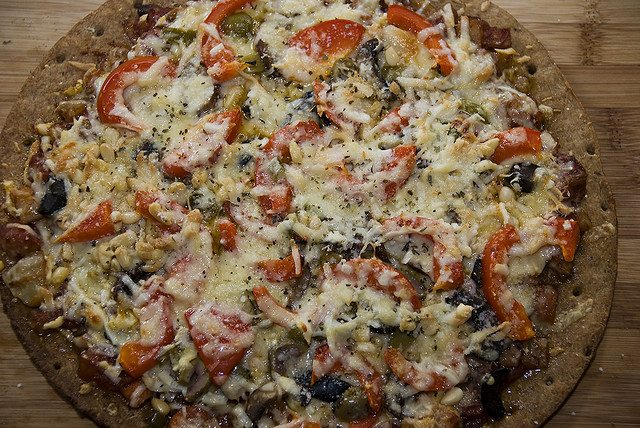 pizza with pine nuts and whole wheat crust