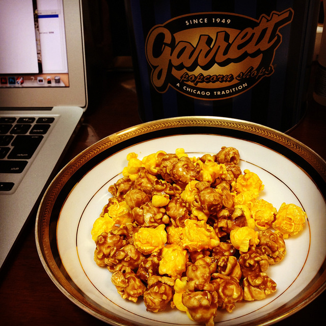 popcorn next to laptop