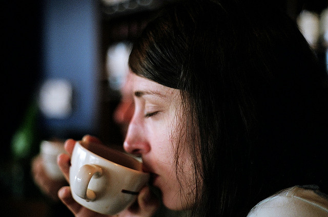 woman sipping coffee