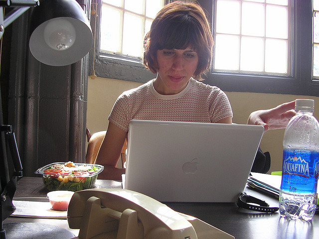 woman working with salad for lunch