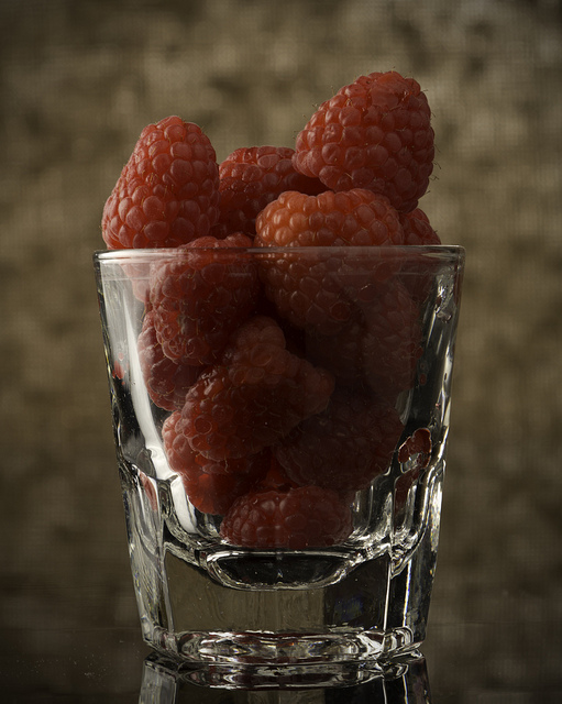 shot glass of raspberries