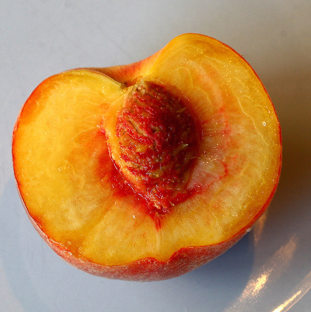 peach sliced in half