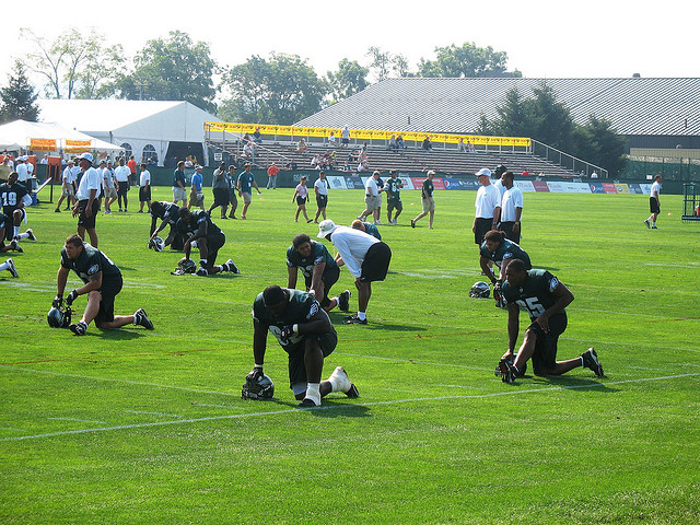 NFL players training on the field inspire workplace wellness