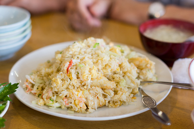 Fried rice looks delicious on a plate.